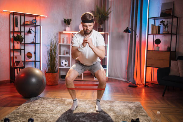 Demonstration of a chair-assisted squat exercise